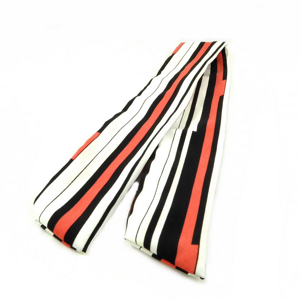 Bandeau cheveux imprimé rayures orange noir