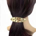 Barrette à cheveux ovale en métal martelé doré