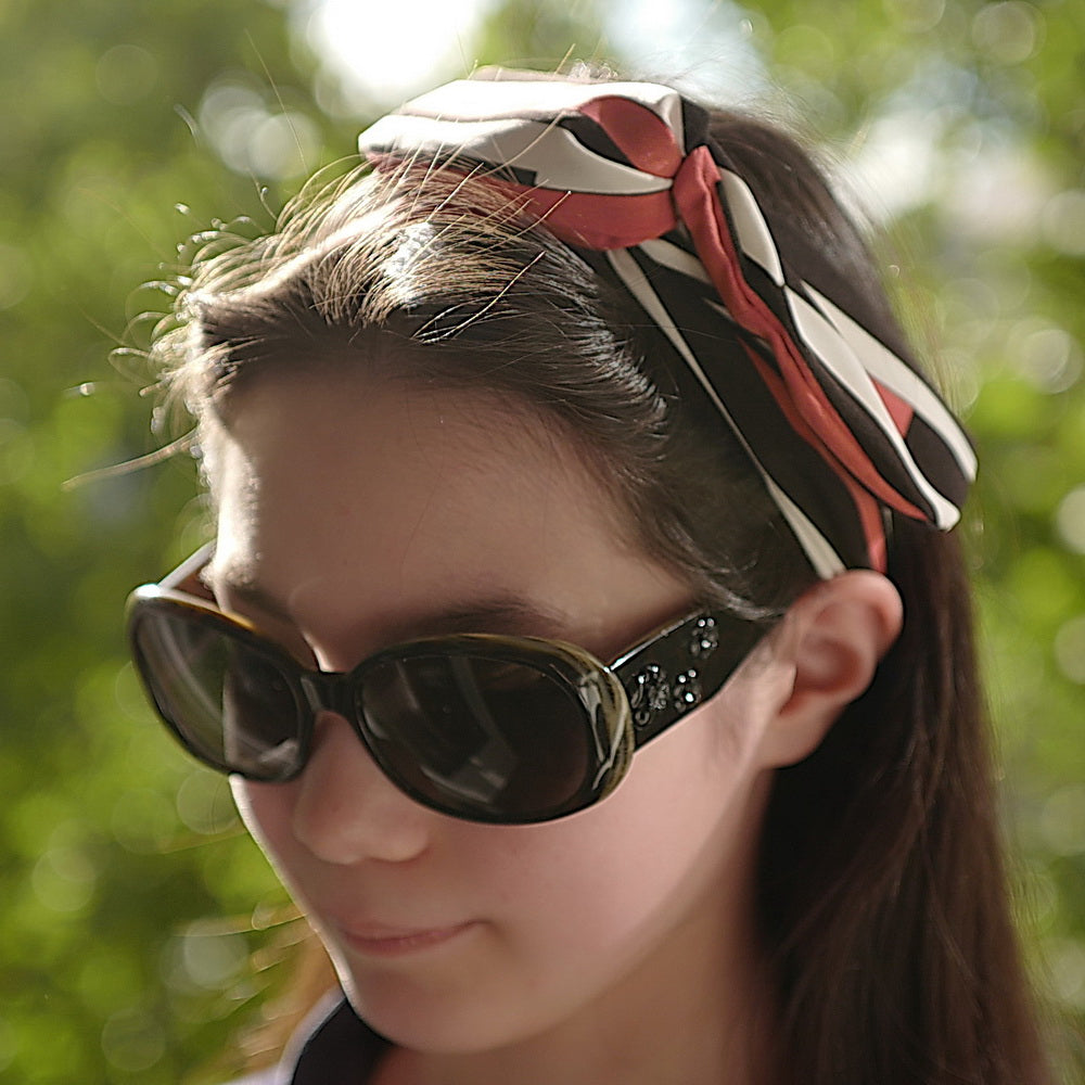 Bandeau cheveux motifs rayures orange noir