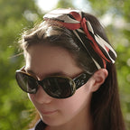Bandeau cheveux motifs rayures orange noir
