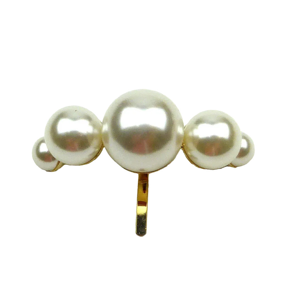 Barrette à cheveux ornée de grosses perles