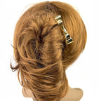 Grand pic à chignon 12cm noeud doré