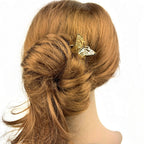 Grand pic à chignon double papillon doré