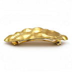 Barrette à cheveux ovale 9cm métal martelé doré