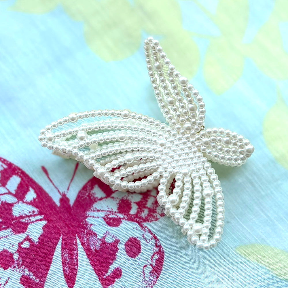 Pince à cheveux papillon perle 9.5cm