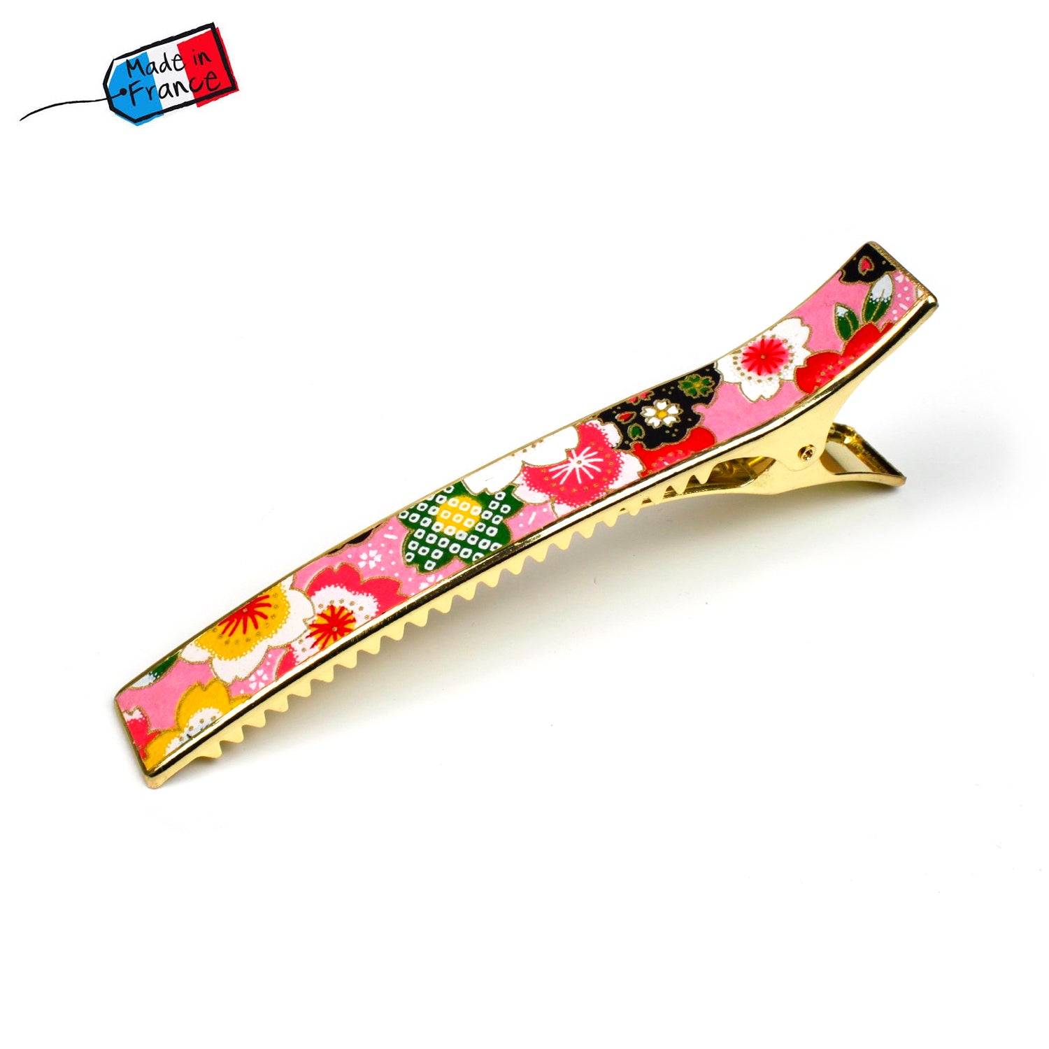 Grande pince cheveux crocodile avec décor fleurs de cerisier sur fond rose