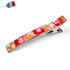 Pince à cheveux longue 12,3 cm à motif fleurs de cerisier sur fond rouge orangé made in France
